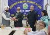 M A Anjum (Retd IGP) being welcomed by DSW at JU for delivering a lecture on Maulana Azad on Monday.