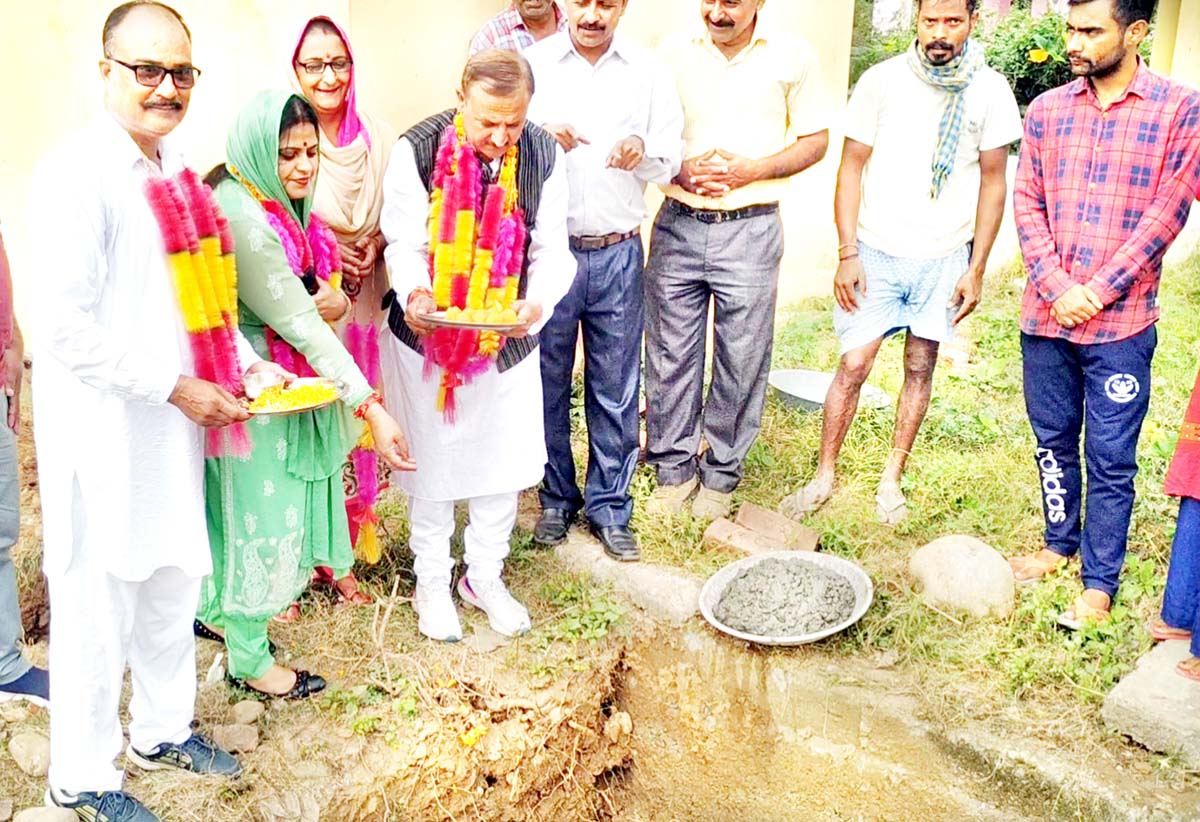 Block Chairman Ghagwal, Vijay Tagotra and Sarpanch Tapyal Panchayat, Kiran Jasrotia laying foundation stone of community toilets in Chan Samotra on Friday. -Excelsior/Gautam Block Chairman Ghagwal, Vijay Tagotra and Sarpanch Tapyal Panchayat, Kiran Jasrotia laying foundation stone of community toilets in Chan Samotra on Friday. -Excelsior/Gautam