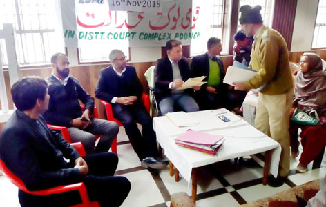 Lok Adalat in progress at Poonch on Saturday. Lok Adalat in progress at Poonch on Saturday.