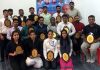 Participants, who offered their services during free Neurotherapy and Speech Therapy Camp, posing for group photograph after being awarded with trophies.