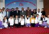 Students holding offer letters posing with Director Batra Group, Manik Batra, Director Principal ASCOMS, Dr Pawan Kotwal and others.