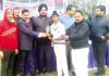 Man of the match award being presented to winner at Marheen in Kathua.