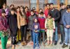 Winners of Chess tournament posing along with chief guest and officials in Jammu.