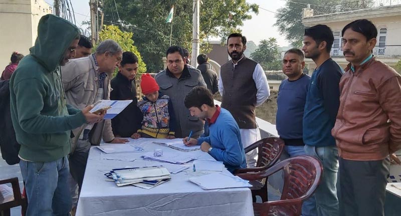 A doctor attending patients during a health checkup camp at Ved Mandir, Amphalla in Jammu. A doctor attending patients during a health checkup camp at Ved Mandir, Amphalla in Jammu.