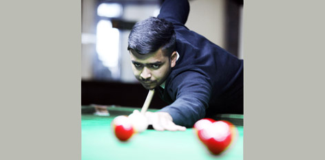 Cueist aiming at target during Junior Snooker Championship in Jammu on Wednesday. -Excelsior/ Rakesh Cueist aiming at target during Junior Snooker Championship in Jammu on Wednesday. -Excelsior/ Rakesh