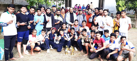 Winners of Kabaddi Tournament posing along with chief guest and other dignitaries in Jammu on Wednesday. Winners of Kabaddi Tournament posing along with chief guest and other dignitaries in Jammu on Wednesday.