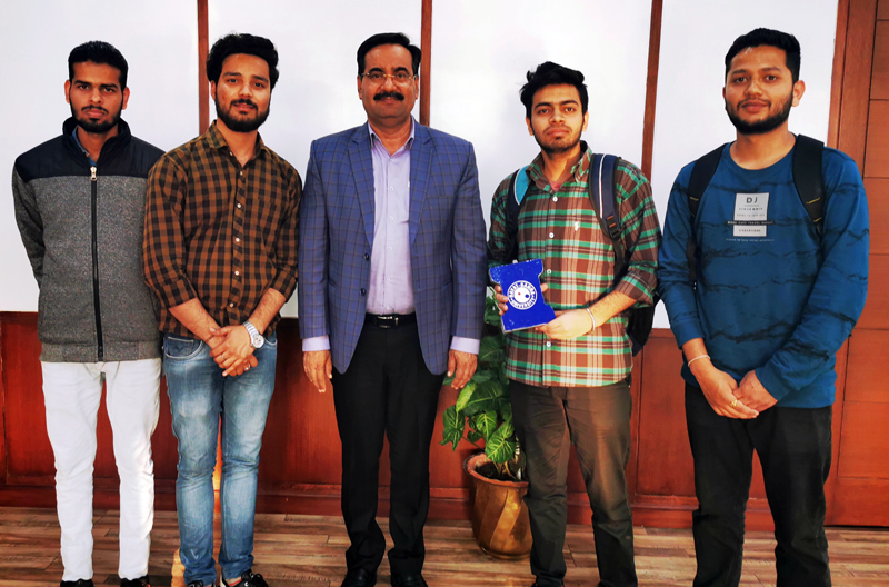 Students, who made flooring tiles from plastic waste posing for group photograph. Students, who made flooring tiles from plastic waste posing for group photograph.