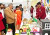 Advisor to LG J&K Farooq Khan seeing the creative minds of the students during visit to exhibition organised during Annual Day Function.