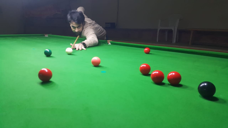 Cueist aiming at target at Billiards Hall, MA Stadium in Jammu. Cueist aiming at target at Billiards Hall, MA Stadium in Jammu.