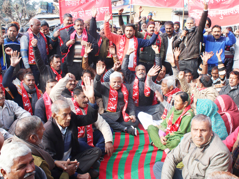 Former Minister Ajay Kumar Sadhotra along with party workers sitting on protest dharna at Marh in Jammu. -Excelsior/Rakesh Former Minister Ajay Kumar Sadhotra along with party workers sitting on protest dharna at Marh in Jammu. -Excelsior/Rakesh