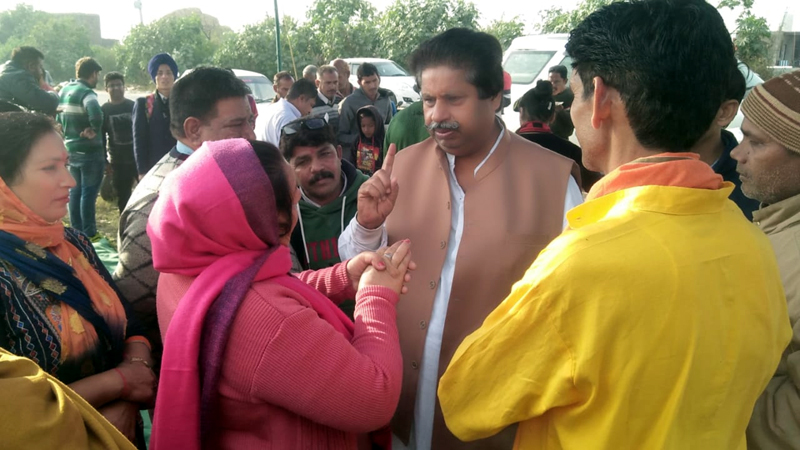 Congress leader Raman Bhalla interacting with people at Beli Charana in Jammu on Tuesday. Congress leader Raman Bhalla interacting with people at Beli Charana in Jammu on Tuesday.