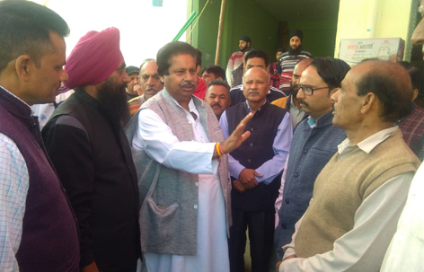 Cong leader Raman Bhalla interacting with people in Gandhi Nagar on Monday. Cong leader Raman Bhalla interacting with people in Gandhi Nagar on Monday.