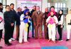 Taekwondo players posing along with chief guest during the inaugural ceremony of Taekwondo Championship in Jammu.