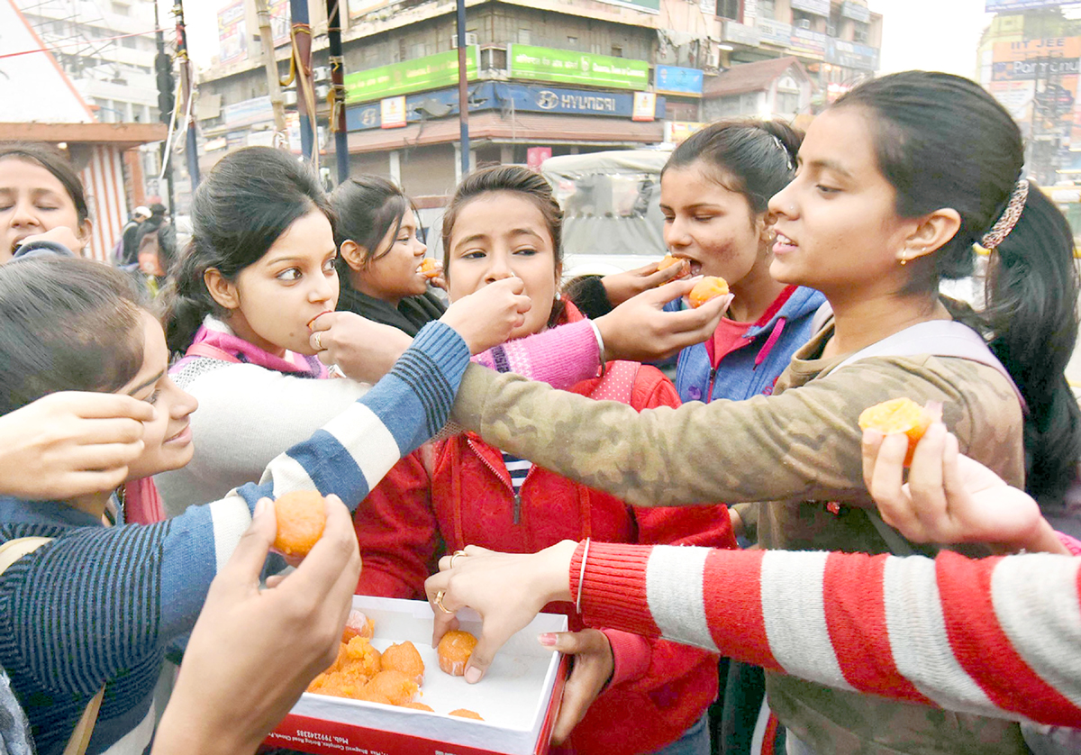 Girls celebrate after Delhi court issued death warrant for the four convicts in the Nirbhaya gang rape and murder case, in Patna on Tuesday. (UNI) Girls celebrate after Delhi court issued death warrant for the four convicts in the Nirbhaya gang rape and murder case, in Patna on Tuesday. (UNI)