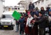 CEC LAHDC, Gyal P. Wangyal flagging off first batch of tourists for 'Chadar Trek-2020' at Leh on Monday. -Excelsior/ Basharat Ladakhi