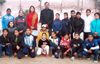 Players and dignitaries posing for group photograph.