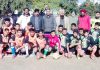 Young footballers posing along with dignitaries and officials during Inter Panchayat/Block Level Football competition.