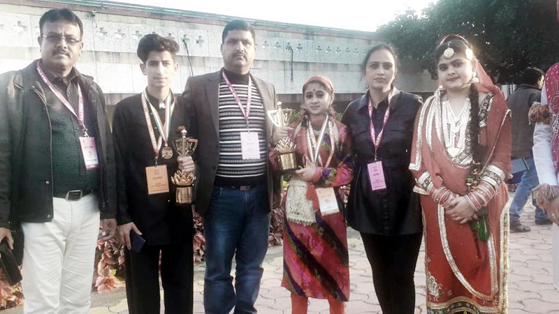 Khushi and Saqib posing along with in-charges after excelling in Kala Utsav National Festival at Bhopal in Madhya Pradesh. Khushi and Saqib posing along with in-charges after excelling in Kala Utsav National Festival at Bhopal in Madhya Pradesh.