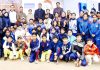 Winners posing along with dignitaries and officials at Parade ground in Jammu.