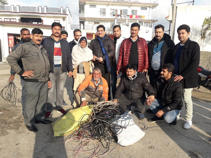 PDD team posing for a group photograph after snapping illegal power connections in Bari Brahmana on Friday. PDD team posing for a group photograph after snapping illegal power connections in Bari Brahmana on Friday.