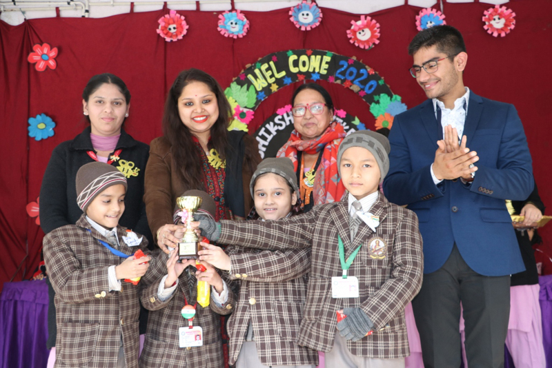 Chief guest of the competition felicitating the winner students in quiz competition. Chief guest of the competition felicitating the winner students in quiz competition.