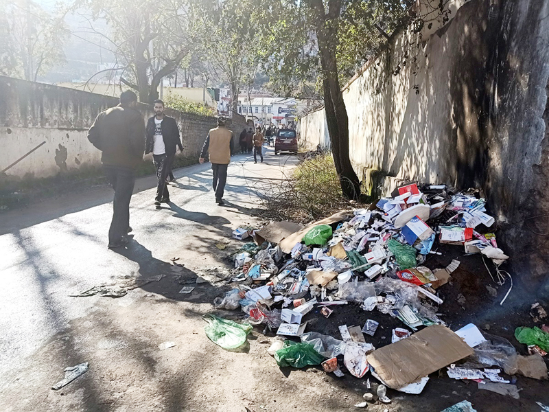 Open garbage dump lying on Hospital Road at Mendhar town. -Excelsior/Rahi Kapoor Open garbage dump lying on Hospital Road at Mendhar town. -Excelsior/Rahi Kapoor