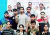 Medal winners in the Cadet and Under-17 National Fencing Championship pose with coach, Shotu Lal Sharma.