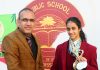Gymnast Bavleen Kour being honoured by Principal KCPS on Friday.