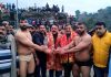 Congress leader Jugal Kishore Sharma declaring winner of Dangal at village Pamote Nalla in Reasi.