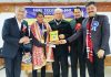 Dignitaries felicitating Shivani Charak at Saigal Hall, Abhinav Theatre in Jammu on Friday.