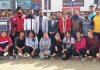 Selected Korfball team members along with dignitaries of Cluster University Jammu posing for a group photograph in Jammu.