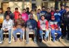 Wrestling team along with coaches and office bearers of JKSC posing for a group photograph in Jammu.