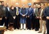WFA delegates posing along with Dr Narinder Dhruv Batra and other dignitaries during a meeting in New Delhi.