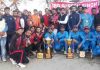 Winners of 3rd Suresh Singh Slathia Memorial Cricket Tournament posing along with chief guest and other dignitaries on Monday.