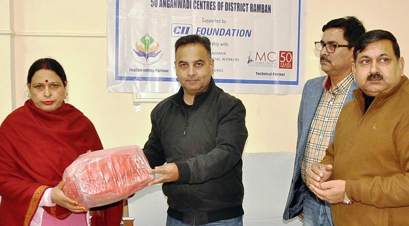 DDC Ramban Nazim Zia Khan distributing teaching learning material kits among Anganwadi Centre workers. DDC Ramban Nazim Zia Khan distributing teaching learning material kits among Anganwadi Centre workers.