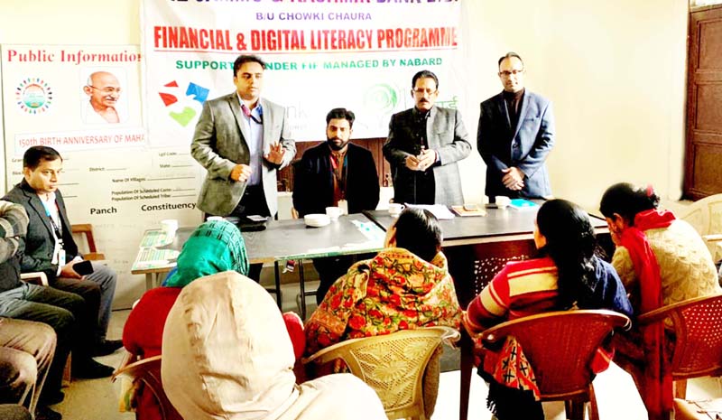 Officials of J&K Bank during a Financial Literacy Camp at Akhnoor on Friday. Officials of J&K Bank during a Financial Literacy Camp at Akhnoor on Friday.