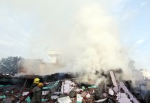 3 firemen killed, 6 injured as 3-storey building collapses after fire Fire fighters dousing flames coming out from the debris of a building at Talab Tillo in Jammu on Wednesday. —Excelsior/Rakesh