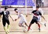 Footballers making efforts to get hold of the ball during a match of Annual Championship in Jammu. -Excelsior/Rakesh