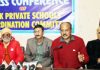 Officials of JKPSCC addressing a press conference at Jammu on Monday. -Excelsior/Rakesh
