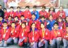 Winner of Annual Sports Day of Nav Yug School along with dignitaries posing for group photograph in Jammu.