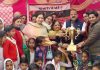 Winners of Inter School Sports Spark receiving trophy from NC Provincial President in Jammu on Tuesday.