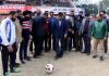 Financial Commissioner, Dr Arun Kumar Mehta testing soccer skills while inaugurating Football Championship at Mini Stadium, Parade in Jammu. -Excelsior/Rakesh