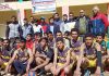 Players posing for a group photograph during inaugural ceremony of Volleyball tournament in Doda.