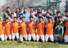 Teams in the Rolling Trophy Football finals posing for a group photograph along with officials in Srinagar.