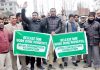 Members of JKTDC Contractors Association protesting in Srinagar. —Excelsior/Shakeel