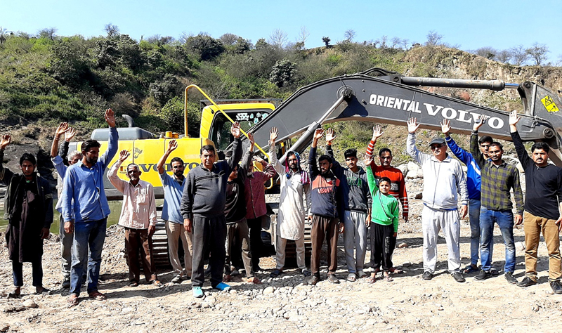 Locals protesting against alleged illegal mining in Birma nallah at Udhampur. Locals protesting against alleged illegal mining in Birma nallah at Udhampur.