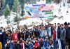 Participants posing along with organizers & officals during inauguration of winter games.