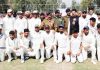 Cricketers posing along with DGP Dilbag Singh and other dignitaries during inaugural ceremony of Police Martyrs Tournament.
