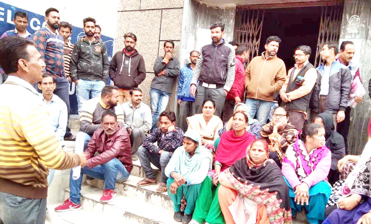 Safai Karamcharis protesting in front of Municipal office Udhampur on Monday. Safai Karamcharis protesting in front of Municipal office Udhampur on Monday.