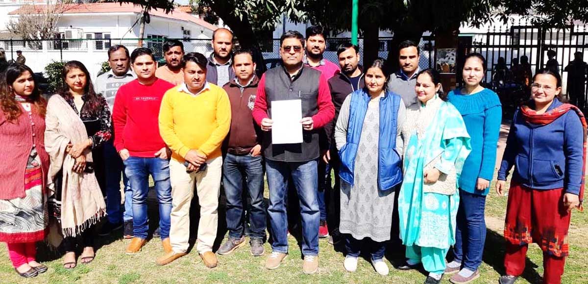 Members of Polytechnic Faculty Association displaying a memorandum of demands during their meeting on Monday. Members of Polytechnic Faculty Association displaying a memorandum of demands during their meeting on Monday.